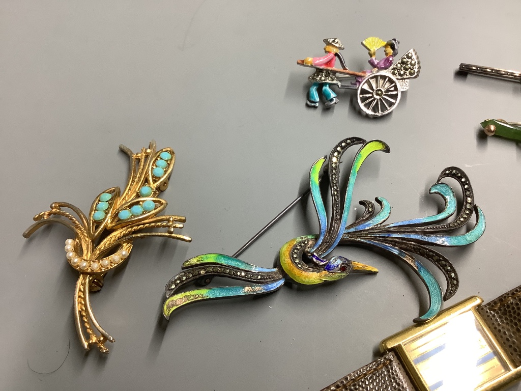 Assorted jewellery including a 9ct and gem set bar brooch, 925 and costume and a Raymond Weil gold plated watch.